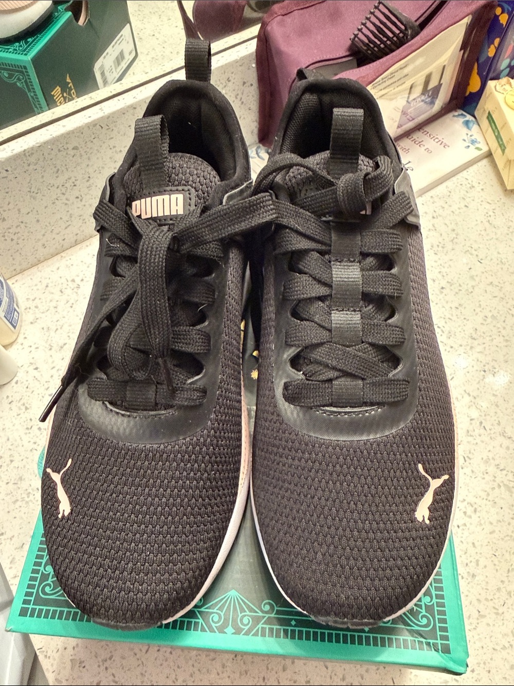 Puma Ladies Black Athletic Sneakers with Pink Accents